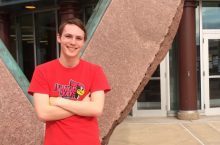 Sam Kempel poses outside Science Lab Building